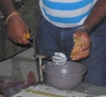 130. Suresh demonstrates the coconut grater