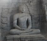 91. Seated Budah, this and the following two carved from one solid rock face