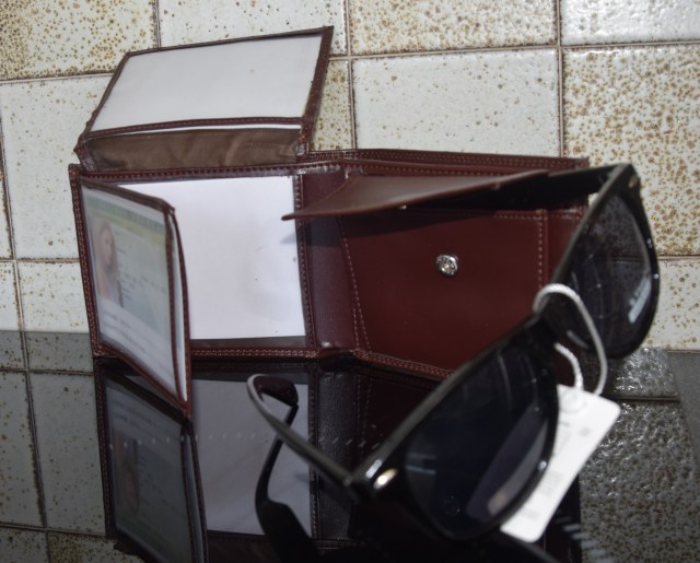 22. wallet and sunnies