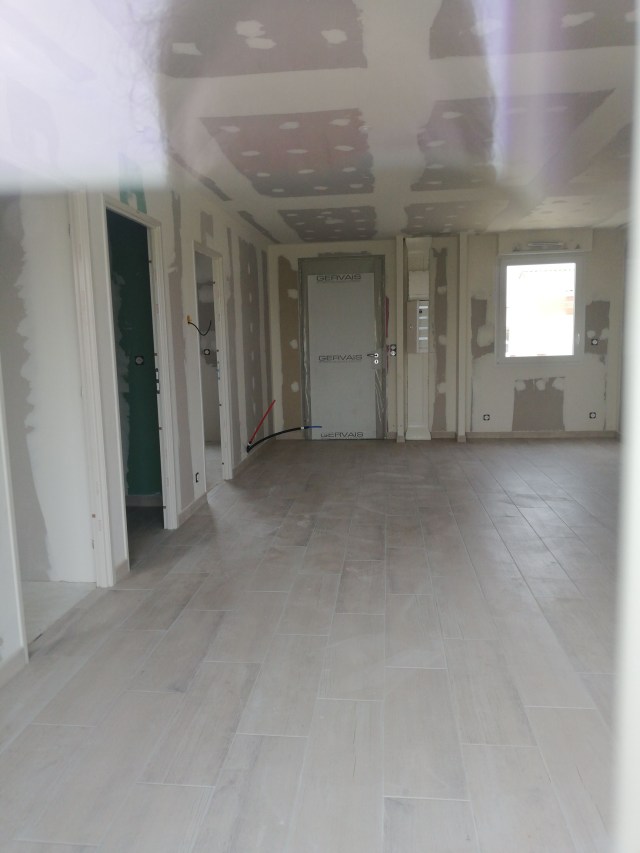 3. ceramic tiles laid in living area