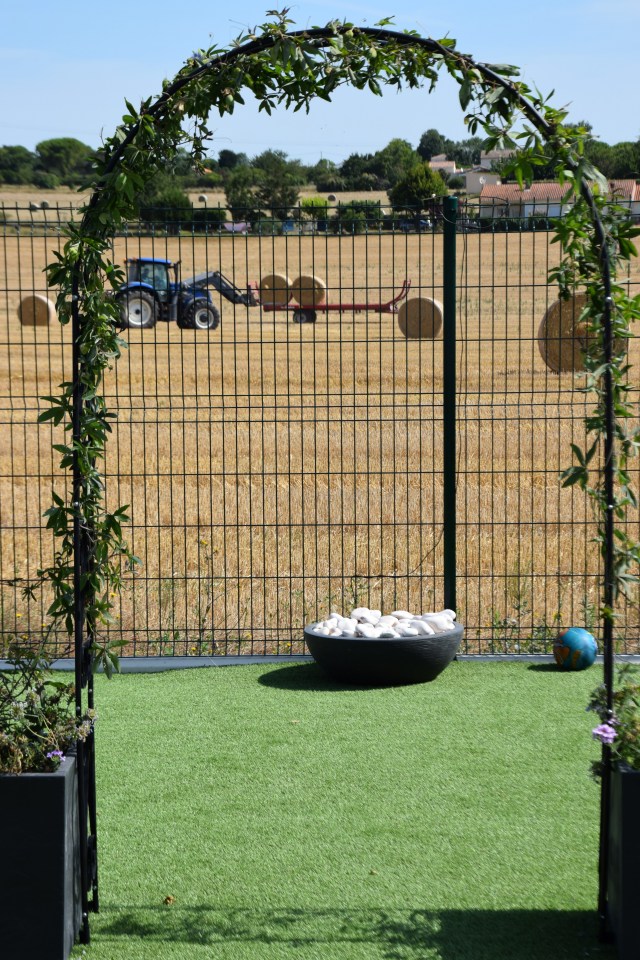 25. loading the hay bales