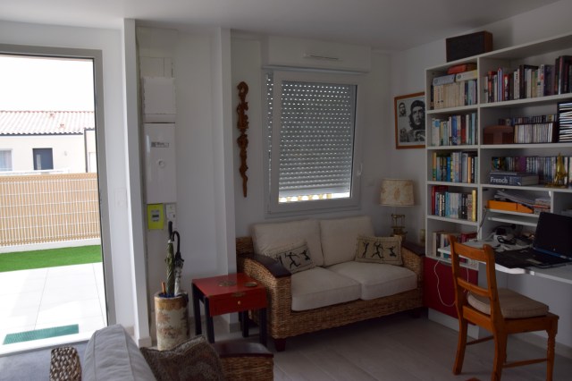 16. squeezing the setee into the gap under the window